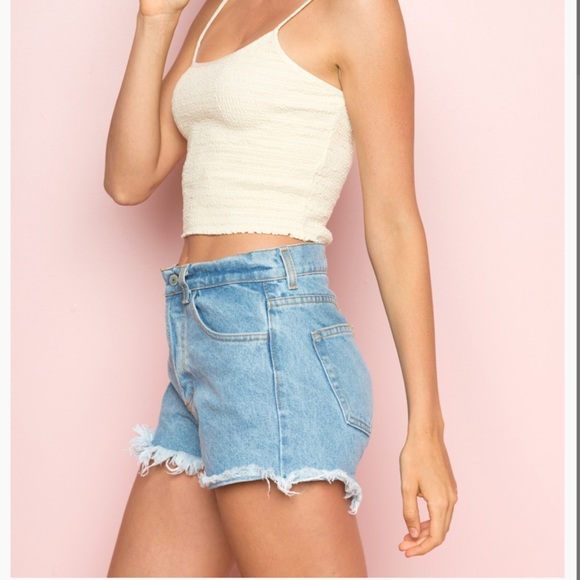 Brandy Melville Pants - Brandy Melville light wash jean cut-off shorts